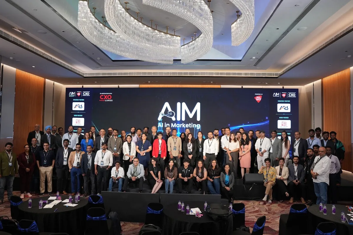 A large group of AIM Summit Bengaluru attendees gathered on stage